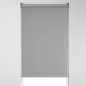 A Blackout Roller Shade is ideal for bedroom window treatment ideas thanks to its ability to block light for room darkening