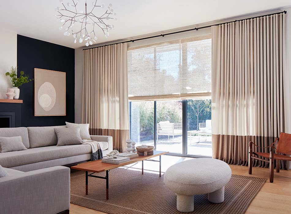 Sliding glass door curtain ideas for a contemporary living room include Ripple Fold Drapery made of Andes in Castle Wall
