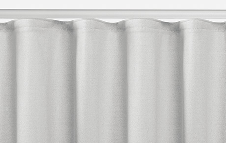 A product image of Ripple Fold Drapery shows the soft S-curves of this modern pleat style that give it a soft linear look
