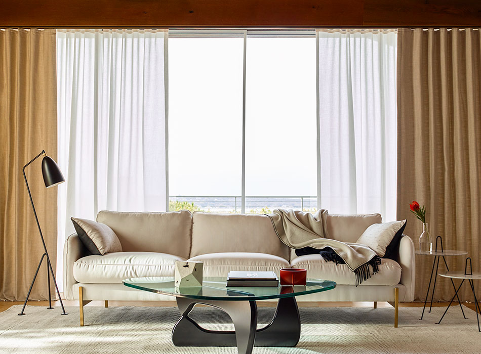 Sliding glass door curtain ideas including layered Ripple Fold Drapery made of Alma in Gravel and Neblina in Snow