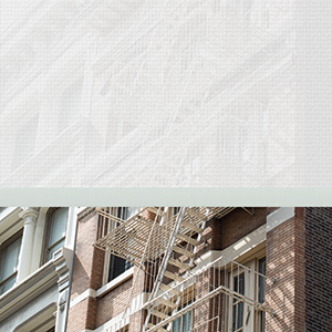 A building is somewhat seen through solar shades for sliding glass doors showing three percent transparency