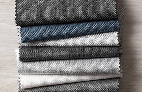 High performance swatches made of Sunbrella Alma material that can be used for drapery lay decoratively on a table