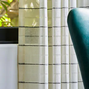 A close up of Martyn Lawrence Bullard's Sahara Stripe in Onyx shows the subtle east-west-striped pattern